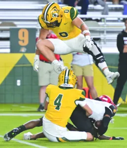 NMU football can’t slow one of nation’s top runners